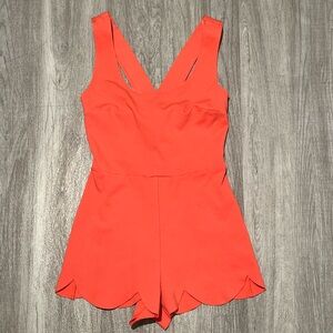 Solemio coral orange scalloped romper